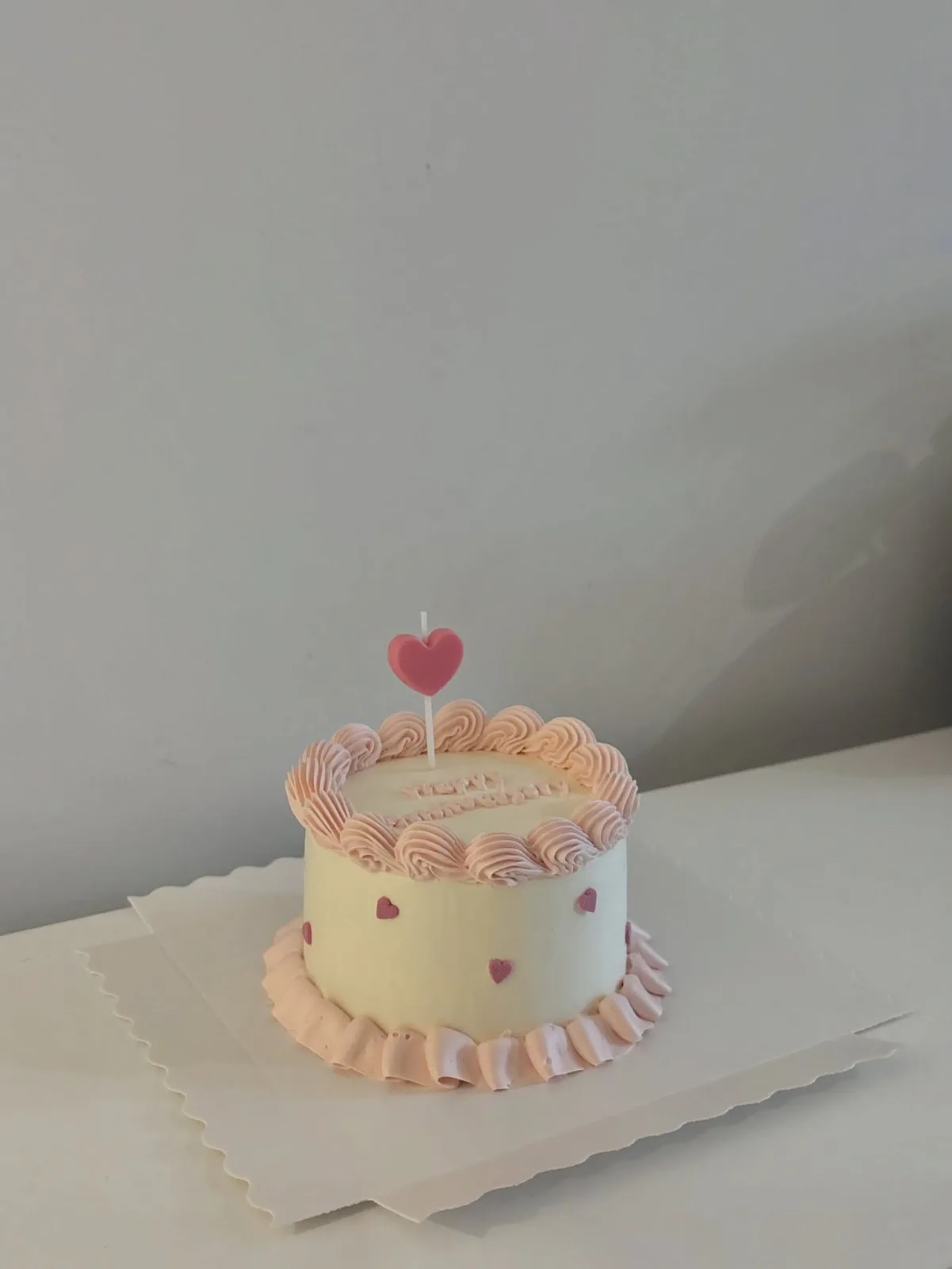 Cream cake with pink hearts and piped scalloped border, Korean-inspired custom cake handmade in Streatham, London