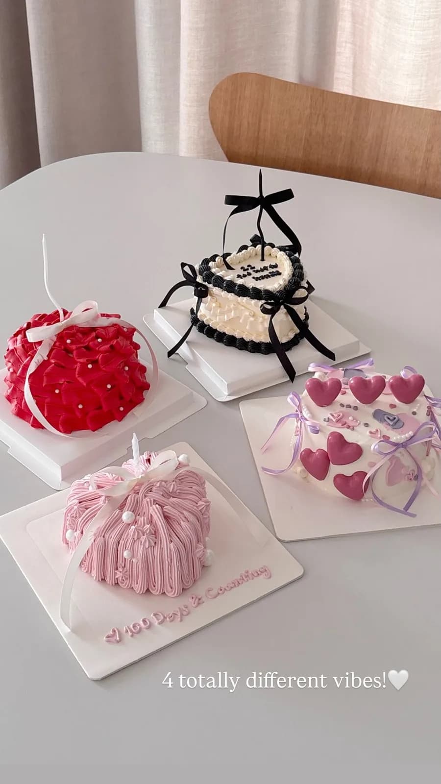 Group of piped dome cakes with ribbons and hearts, bespoke celebration cake from Danine Cakes, South London