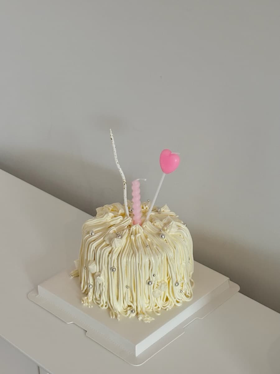 Ivory fluffy dome with pink heart accent