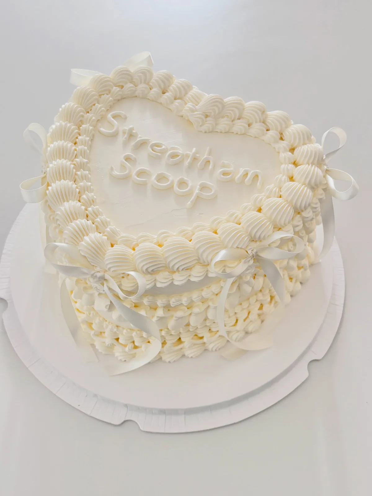 Ivory heart cake with piped lettering and shell border, custom cake made in Streatham SW16 - Danine Cakes