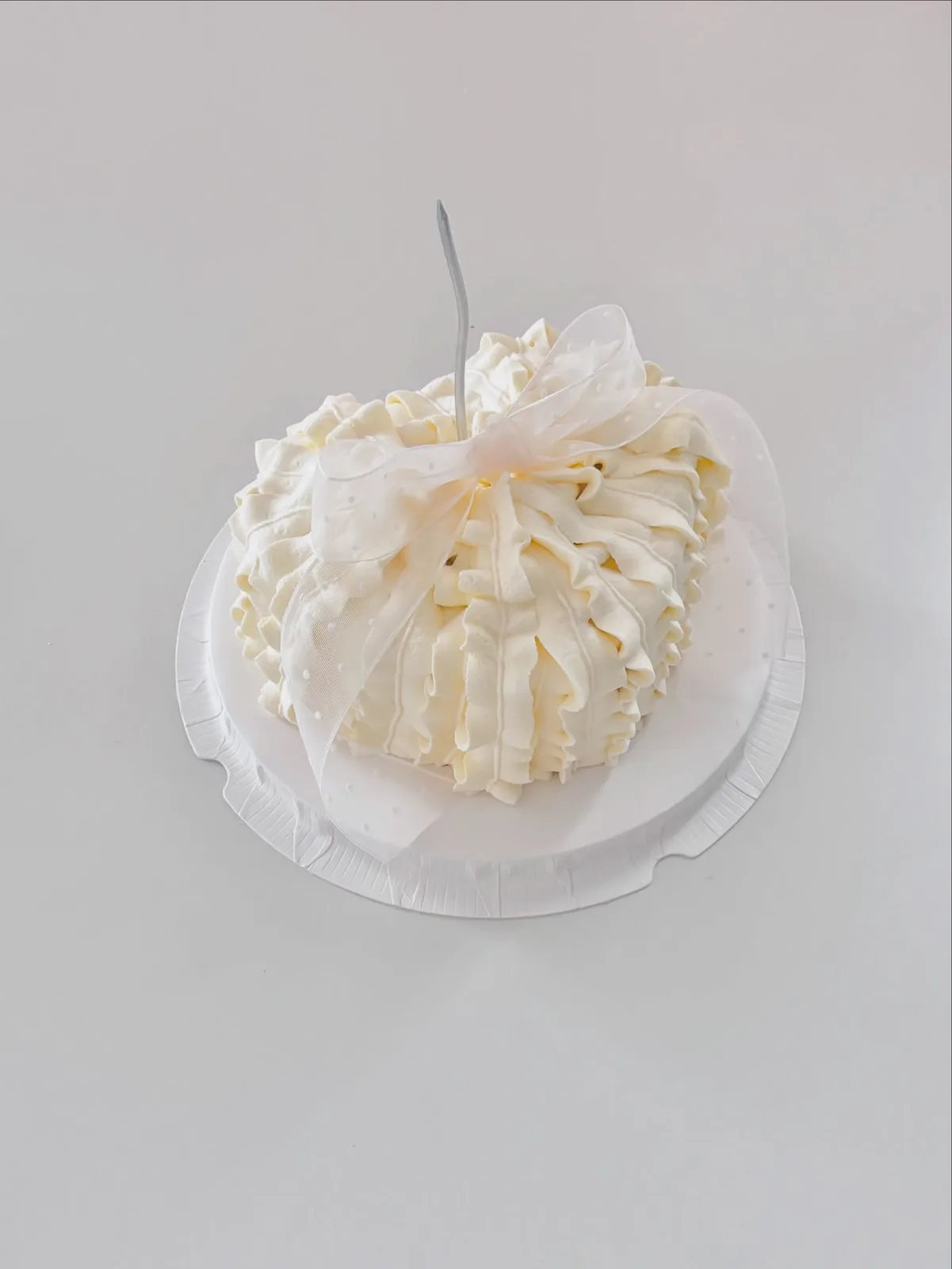 Ivory piped dome cake with organza ribbon, Korean-inspired custom cake handmade in Streatham, London