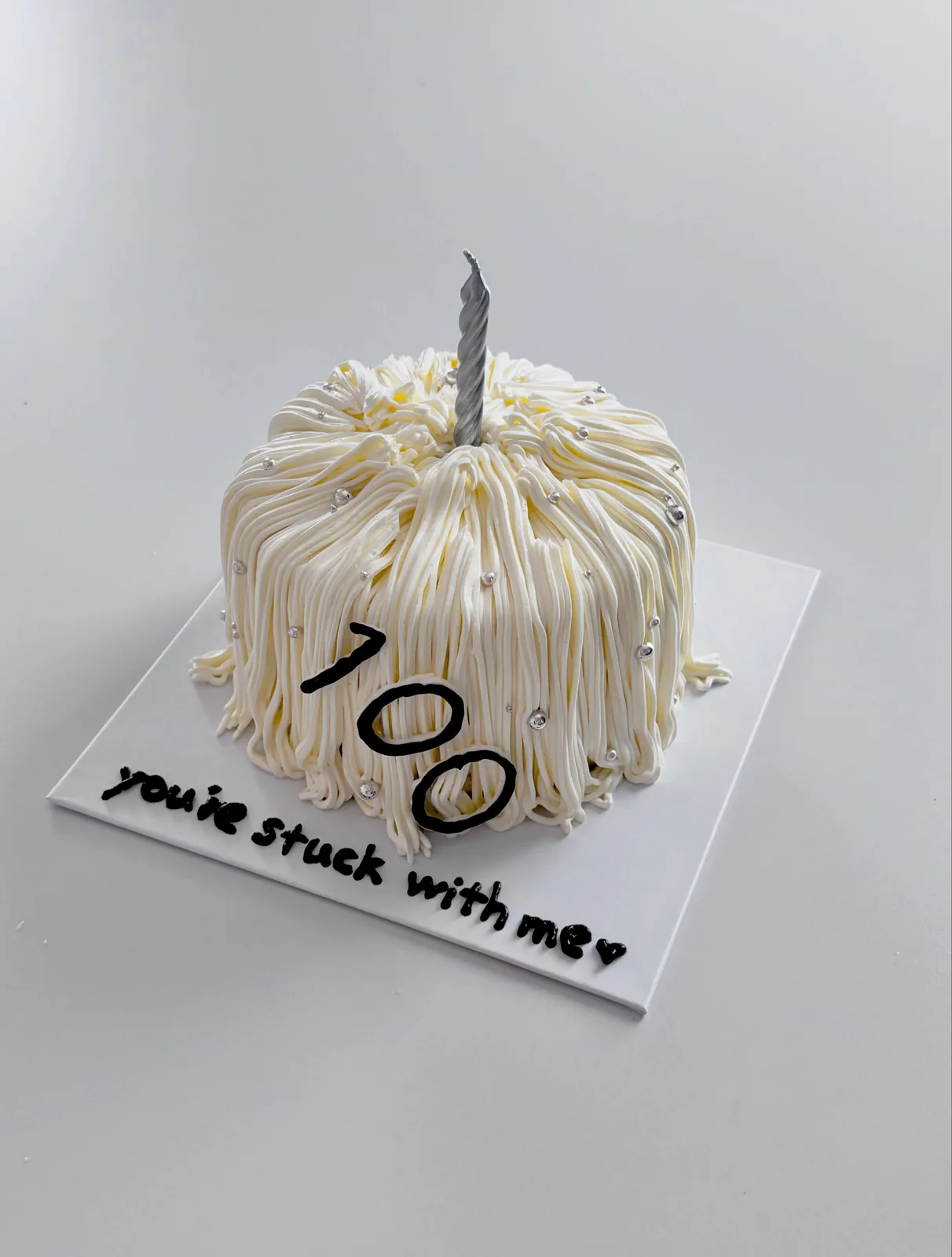 Ivory piped strand cake with hundred day lettering, handmade to order by Danine Cakes in Streatham, South London
