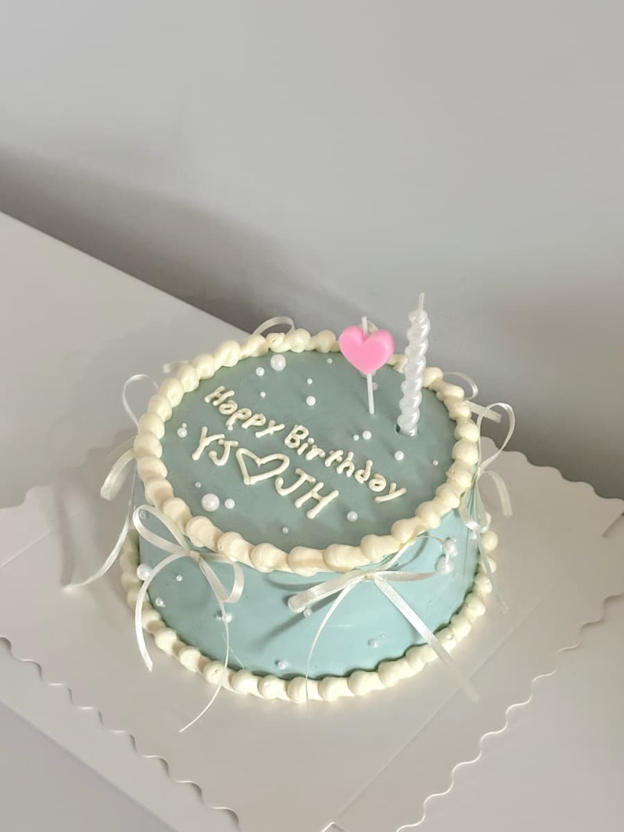 Mint blue with hand-piped personalised lettering