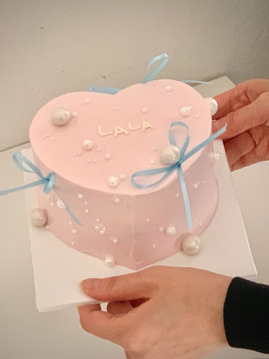 Pink heart with scattered pearl details