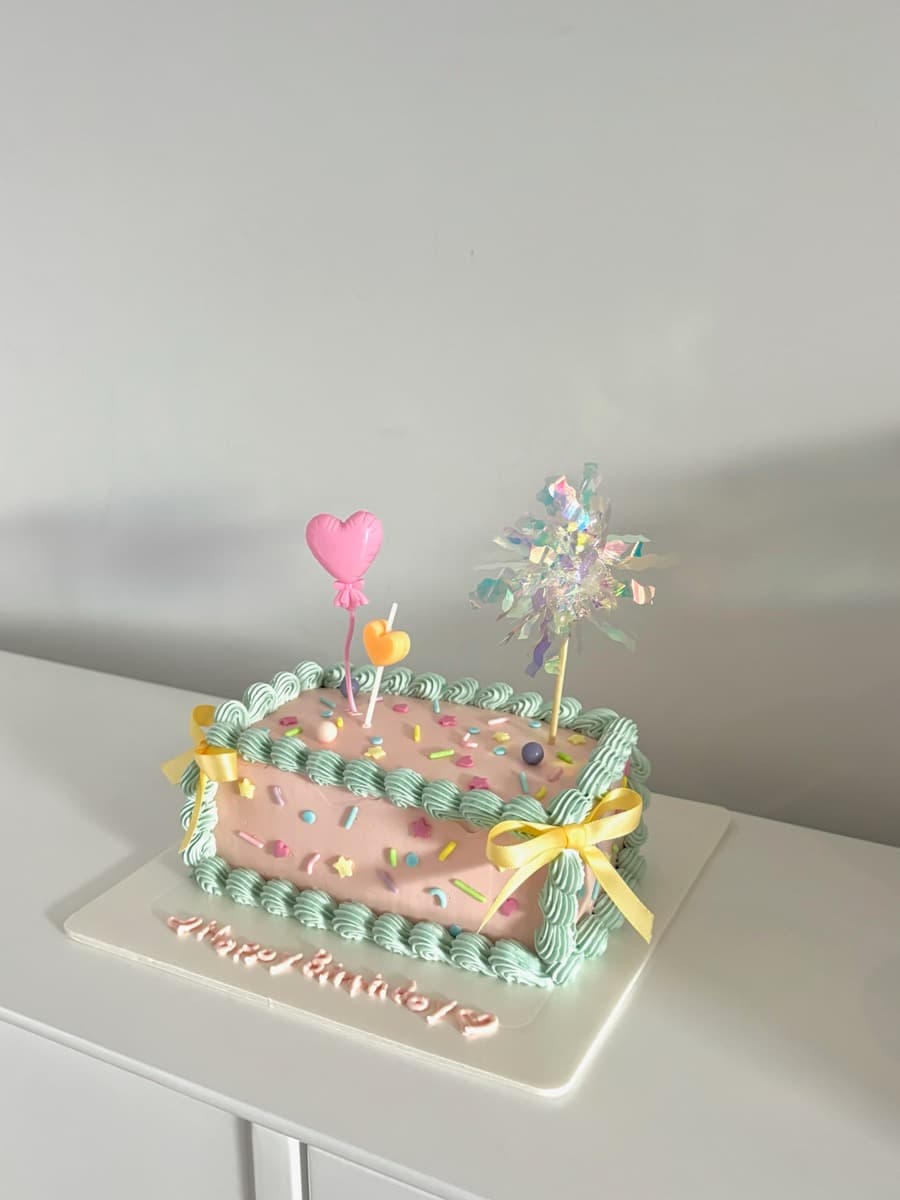 Pink rectangle with confetti sprinkles