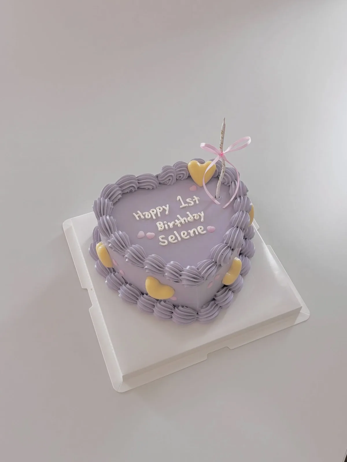 Lilac heart cake with yellow hearts and piped border, bespoke celebration cake from Danine Cakes, South London
