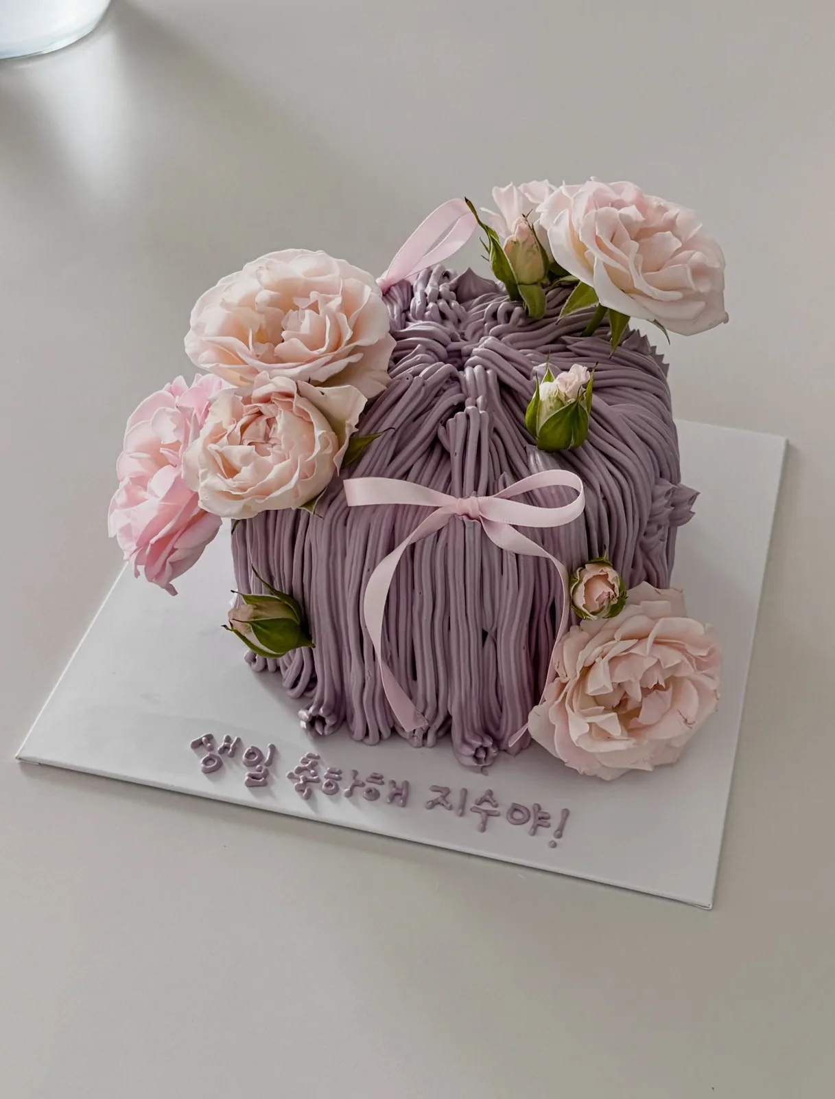 Lilac piped strand cake with fresh roses, Korean-inspired custom cake handmade in Streatham, London