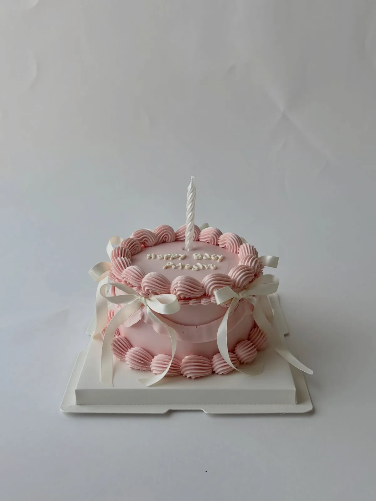 Pink striped cake with piped pearls and shells, custom cake made in Streatham SW16 - Danine Cakes