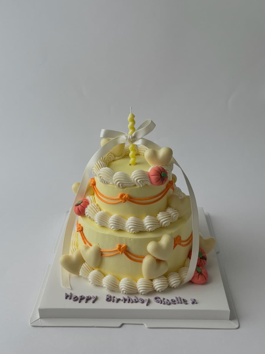 Two-tier yellow with pumpkin & heart details