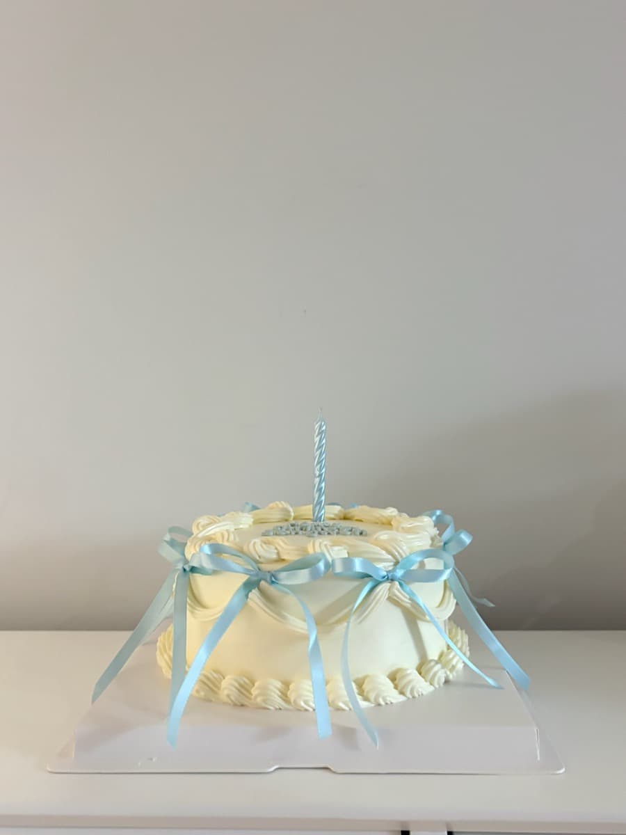 Vintage white with delicate blue satin bows