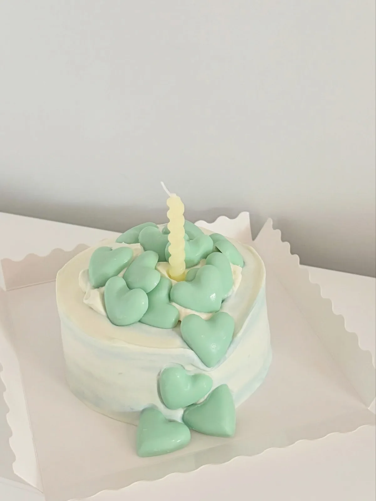 White cake with mint hearts and piped candle, custom cake made in Streatham SW16 - Danine Cakes